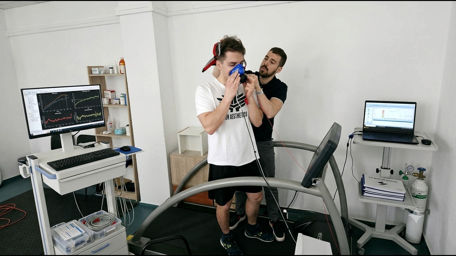Dr. Oliver Szabella running a treadmill gas-analysis assessment in the performance lab